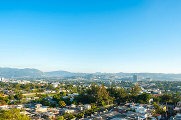 Fototapeta na wymiar Panoramic of the city of San Salvador in summer days
