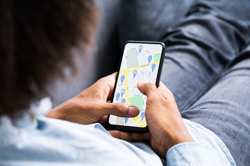 African American Using Navigation Map