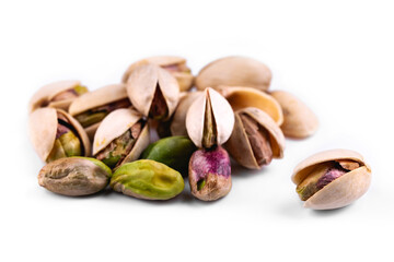 fresh pistachios on white background