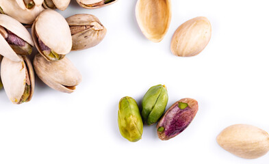fresh pistachios on the white background