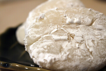 Closeup on a single bun of Japanese mochi.