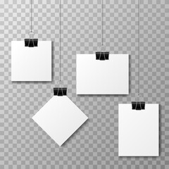 Set of binder clips on a piece of paper on a transparent background. Clerical clothespin vector illustration with shadow