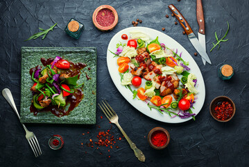 Meat salad with fresh vegetables.