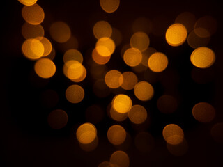 The bokeh background image is shining golden in the night and luxury.
