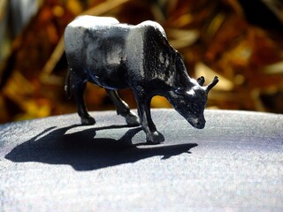 toy white metal bull
