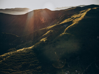 View of the Carpathian Mountains. Green forest against the sky, rocky mountains and beautiful...