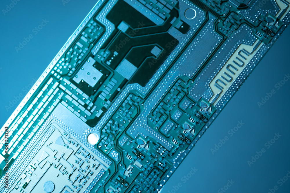 Poster microboard on a dark background. pcb board without processors and labels. fragment of pcb board clos