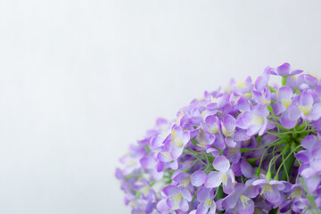 Fototapeta premium Beautiful flowers background. Colorful artificial flowers made from plastic and fabric.