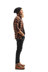 Naklejka premium Full length profile shot of a guy with beard and mustache wearing a hat