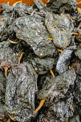 Black Chili in a pile ready for sale.