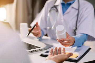 Doctors explain the use of medication to patients. healthcare and medical concept. 