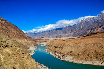 Naklejka na ściany i meble Famous Indus river alongside the Karakoram highway