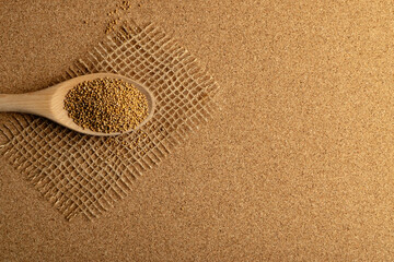 Mustard Seeds in Wooden Spoon Top View