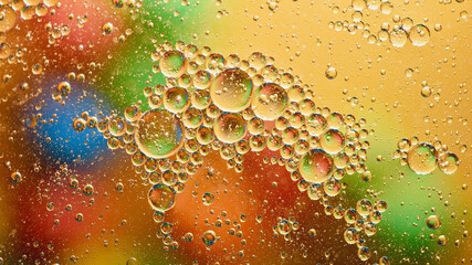 oil with bubbles on color background. Abstract space background. Soft selective focus. macro of oil drops on water surface. copy space. air bubbles in water