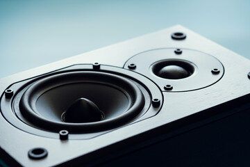 Closeup of black premium loudspeaker for music and home theater system with color mood and tone...