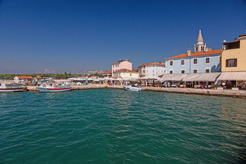 Fototapeta na wymiar View onver the harbour of the historic town of Fazana on Istrian peninsula during daytime