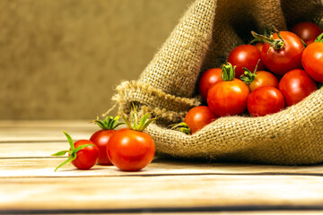 Tomatoes on wood background
