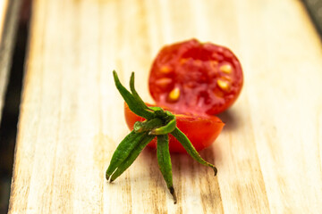 Tomatoes on wood background