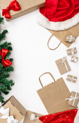 gifts package box white background christmas tree red hat new year delivery top view