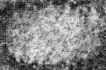 The grunge texture is black and white. Monochrome abstract background. Pattern of scratches, chips, and paint strokes. Black smudges, scuffing, wear and tear
