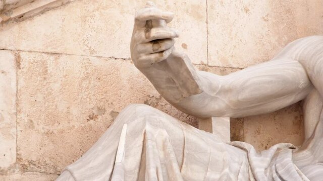 Close up of Fontana della Dea Roma sculpture in Rome city, Italy. Camera moving along Fountain of the Goddess Rome on Capitoline hill