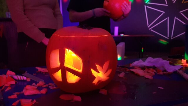 halloween pumpkin lantern handmade mith peace weed leafe symbol