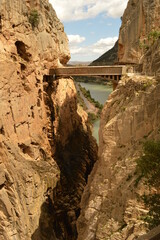 Fototapeta na wymiar The dramatic and scary El Caminito Del Rey hiking path and Ronda Bridge in Southern Spain