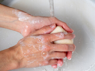 hand washing with soap. Concept of personal hygiene, countering viruses and microbes