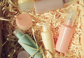 Various cosmetic tubes in a gift box