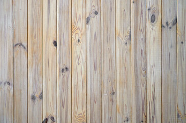 Light gray polished wooden planks fastened together. Natural wood texture for background or interior, empty template. Concept of carpentry, woodwork production. Close up, top view.