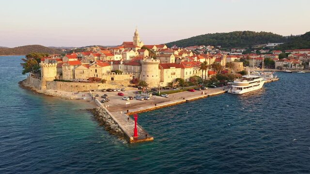 Aerial view of the Korcula old town in Croatia by the Adriatic sea in the Balkans. Shot with a rotation motion