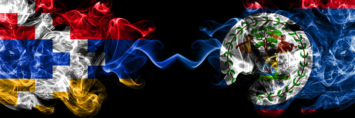 Nagorno-Karabakh, Artsakh vs Belize, Belizean smoky mystic flags placed side by side. Thick colored silky abstract smoke flags
