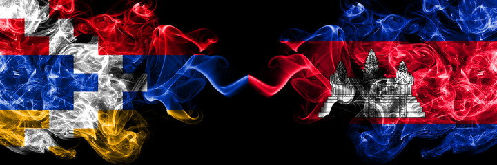 Nagorno-Karabakh, Artsakh vs Cambodia, Cambodian smoky mystic flags placed side by side. Thick colored silky abstract smoke flags
