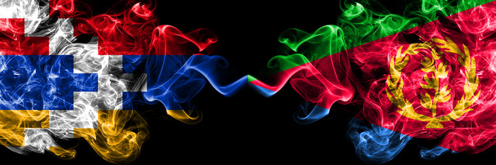 Fototapeta premium Nagorno-Karabakh, Artsakh vs Eritrea smoky mystic flags placed side by side. Thick colored silky abstract smoke flags