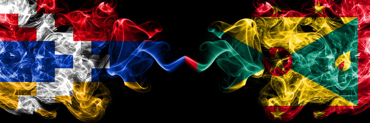 Nagorno-Karabakh, Artsakh vs Grenada smoky mystic flags placed side by side. Thick colored silky abstract smoke flags