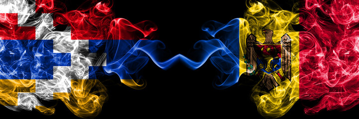 Nagorno-Karabakh, Artsakh vs Moldova, Moldovan smoky mystic flags placed side by side. Thick colored silky abstract smoke flags