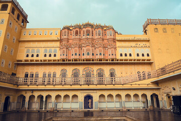 Hawa Mahal or Palace of winds or breeze, honeycomb construction, ancient building tourist destination  Jaipur, Rajasthan, North India. Historical monument  of red and pink sandstone for royal women 