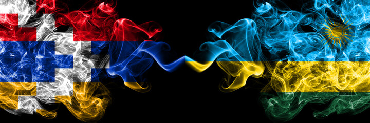 Nagorno-Karabakh, Artsakh vs Rwanda, Rwandan smoky mystic flags placed side by side. Thick colored silky abstract smoke flags