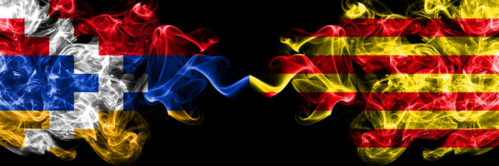 Nagorno-Karabakh, Artsakh vs Spain, Catalonia, Catalan, Senyera smoky mystic flags placed side by side. Thick colored silky abstract smoke flags