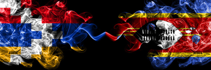 Nagorno-Karabakh, Artsakh vs Swaziland, Swazi smoky mystic flags placed side by side. Thick colored silky abstract smoke flags