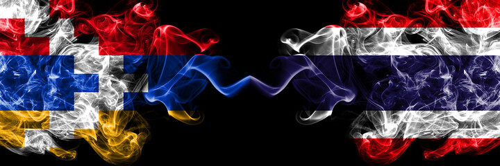 Nagorno-Karabakh, Artsakh vs Thailand, Thai smoky mystic flags placed side by side. Thick colored silky abstract smoke flags