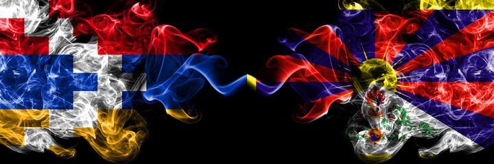 Nagorno-Karabakh, Artsakh vs Tibet, Tibetan smoky mystic flags placed side by side. Thick colored silky abstract smoke flags