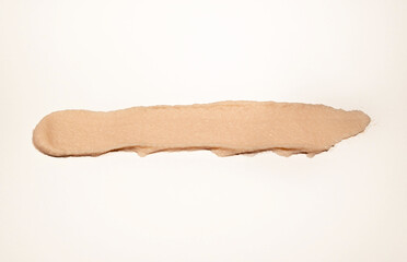 smear of toothpaste on a white background