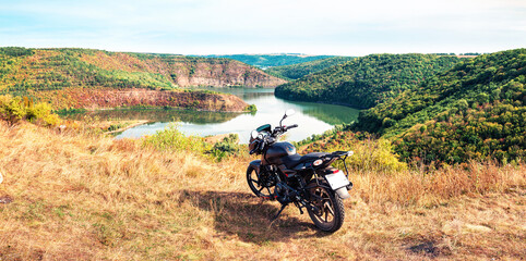 Motorcycle traveling concept, scenic nature landscape with canyon in the national nature park Podilski Tovtry, Studenytsia and Dnister river, Ukraine