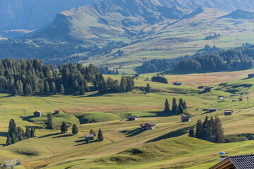 View of the largest high-altitude alpine meadow in Alpe di Siusi or Seiser Alm, Val Gardena, Dolomites, South Tyrol, Italy