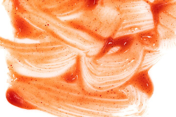 Tomato ketchup sauce  on a white background. Spots and stripes ketchup texture