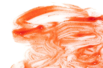 Tomato ketchup sauce  on a white background. Spots and stripes ketchup texture