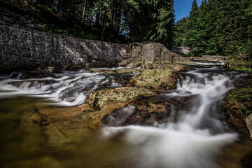 Mountain brook waterfall time lapse