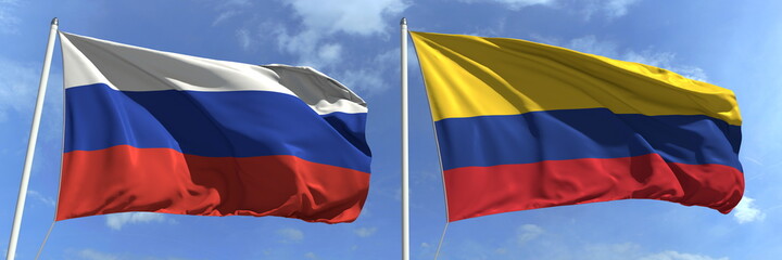 Flags of Russia and Colombia on flagpoles. 3d rendering