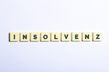 Insolvenz in Buchstaben auf weißem Hintergrund
